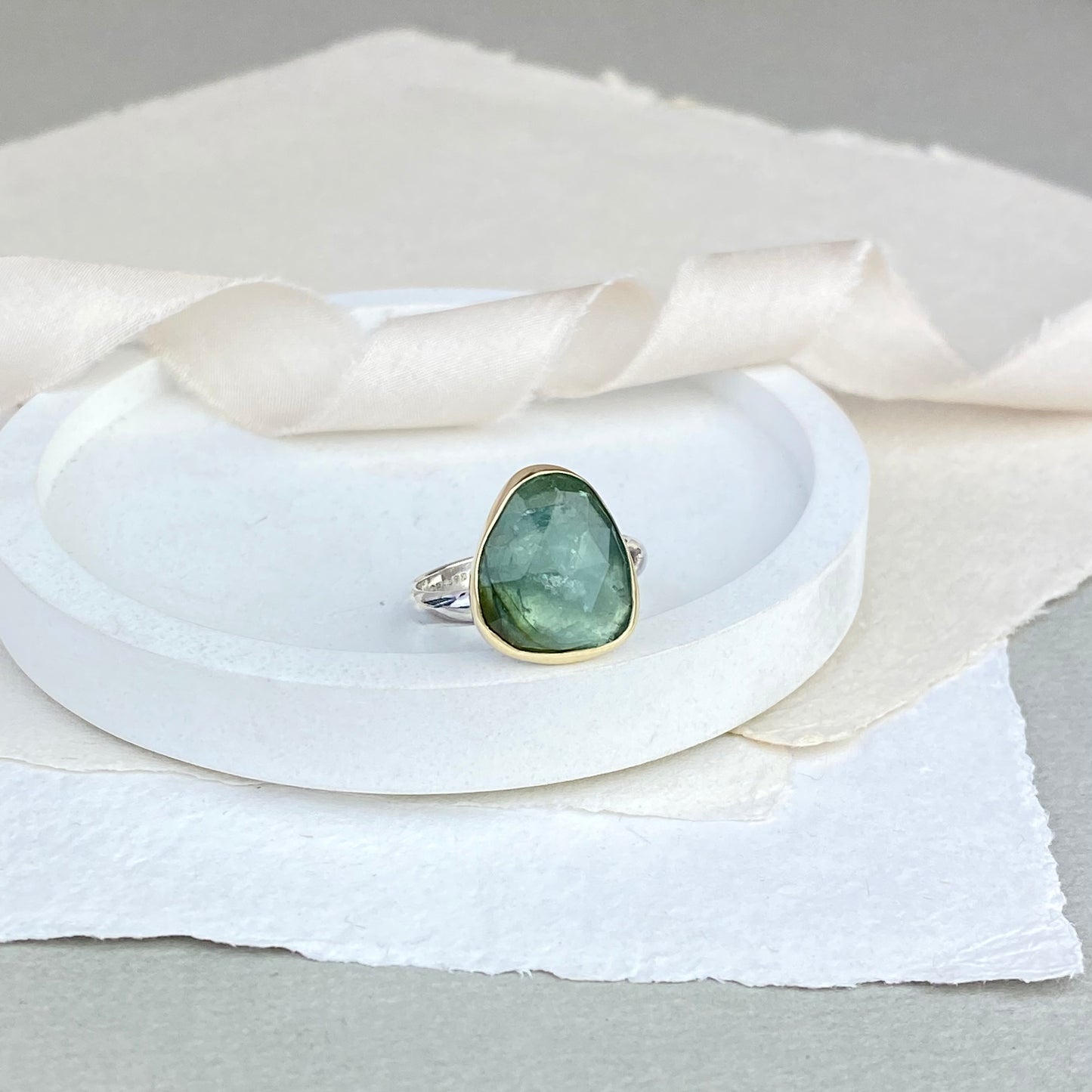 Green tourmaline ring in gold and silver