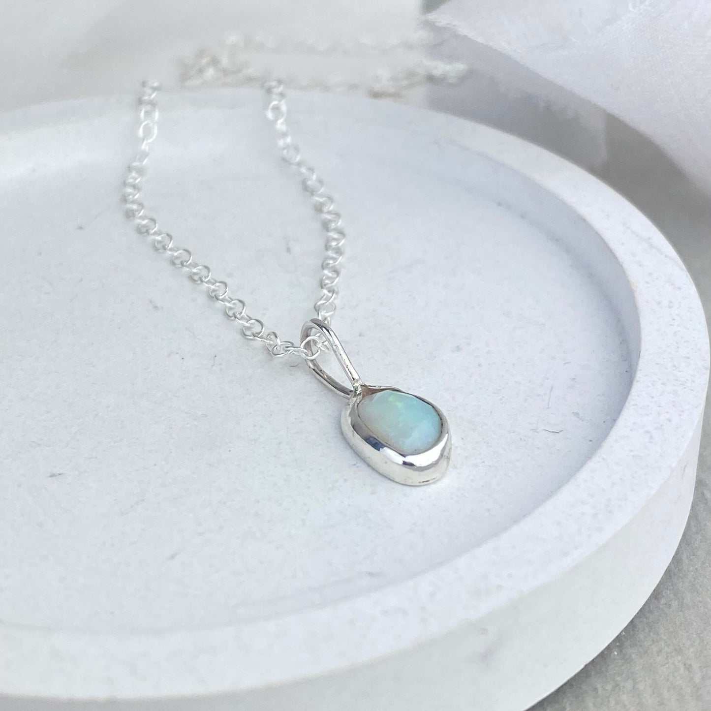 Silver and opal pendant