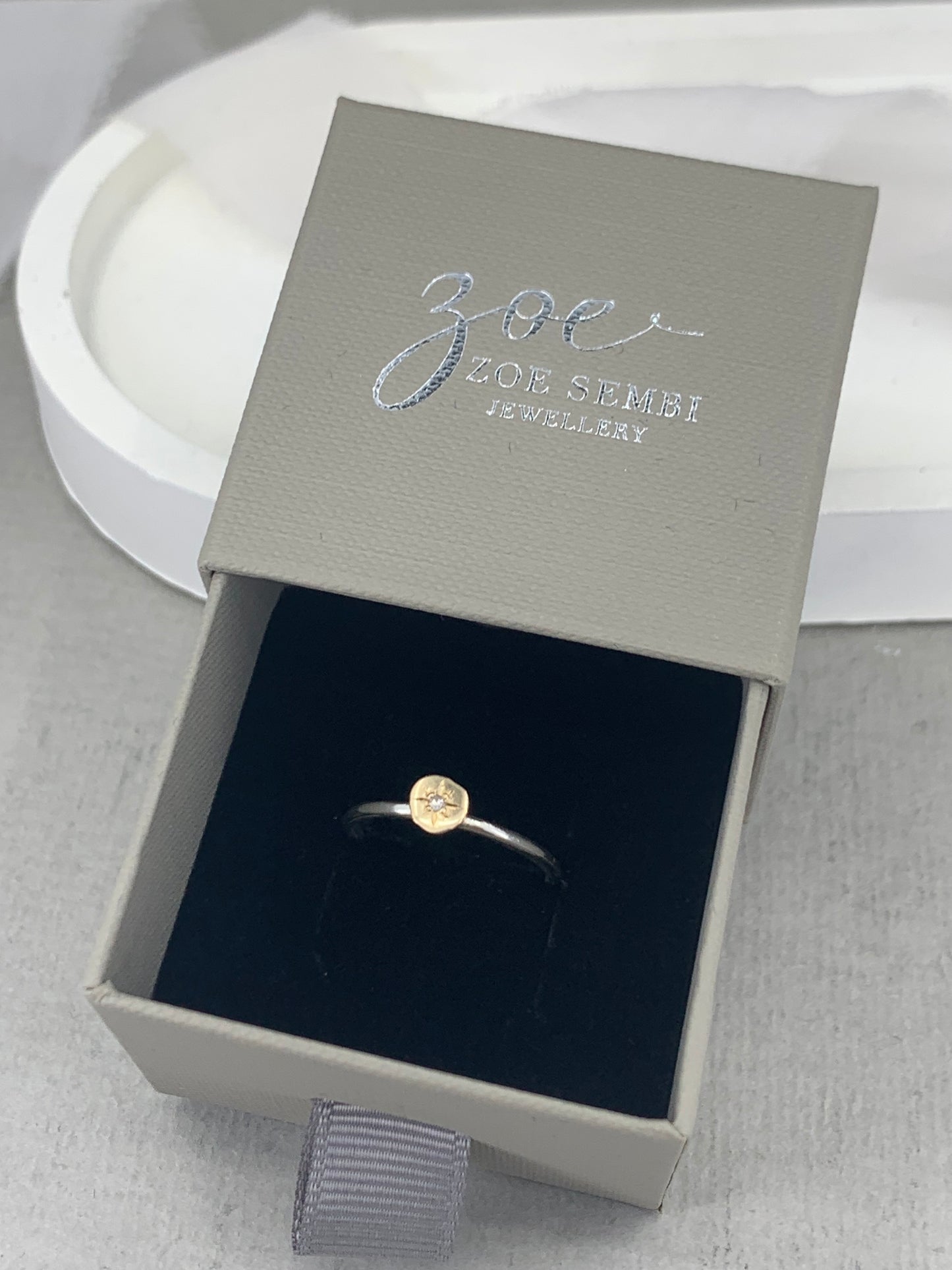 Star set diamond gold and silver ring