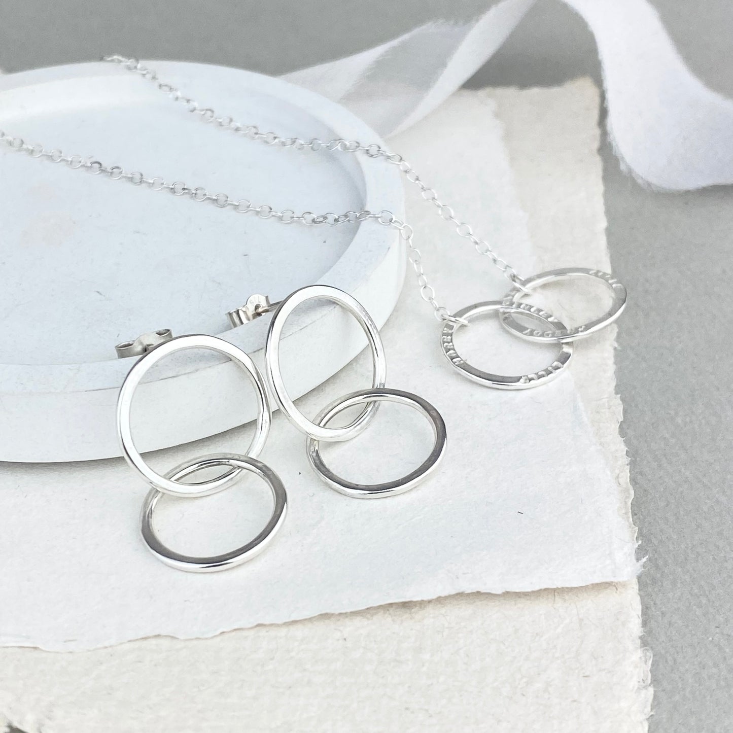 The Laurel Earrings - sterling silver interlinking double ring studs