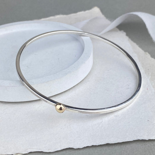 The Broad Bangle - sterling silver and 9ct gold personalised bangle