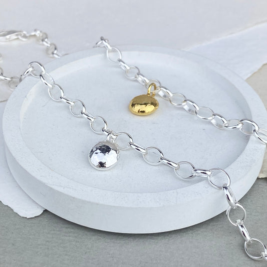 Silver chunky bracelet with silver or gold charm