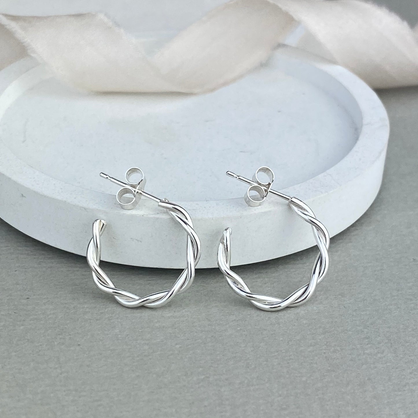 Twisted silver hoop earrings
