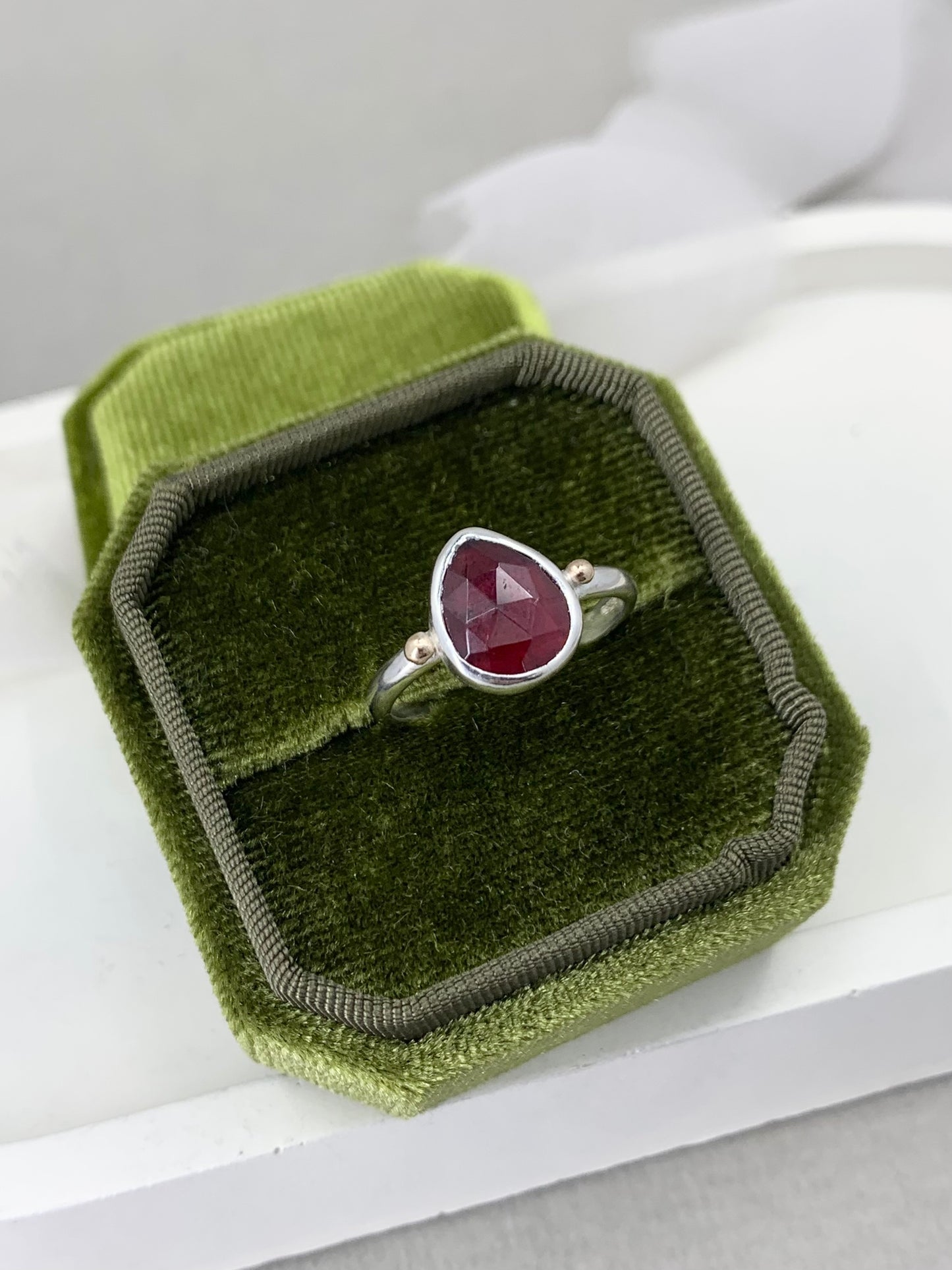 Garnet ring in sterling silver with 9ct gold detail