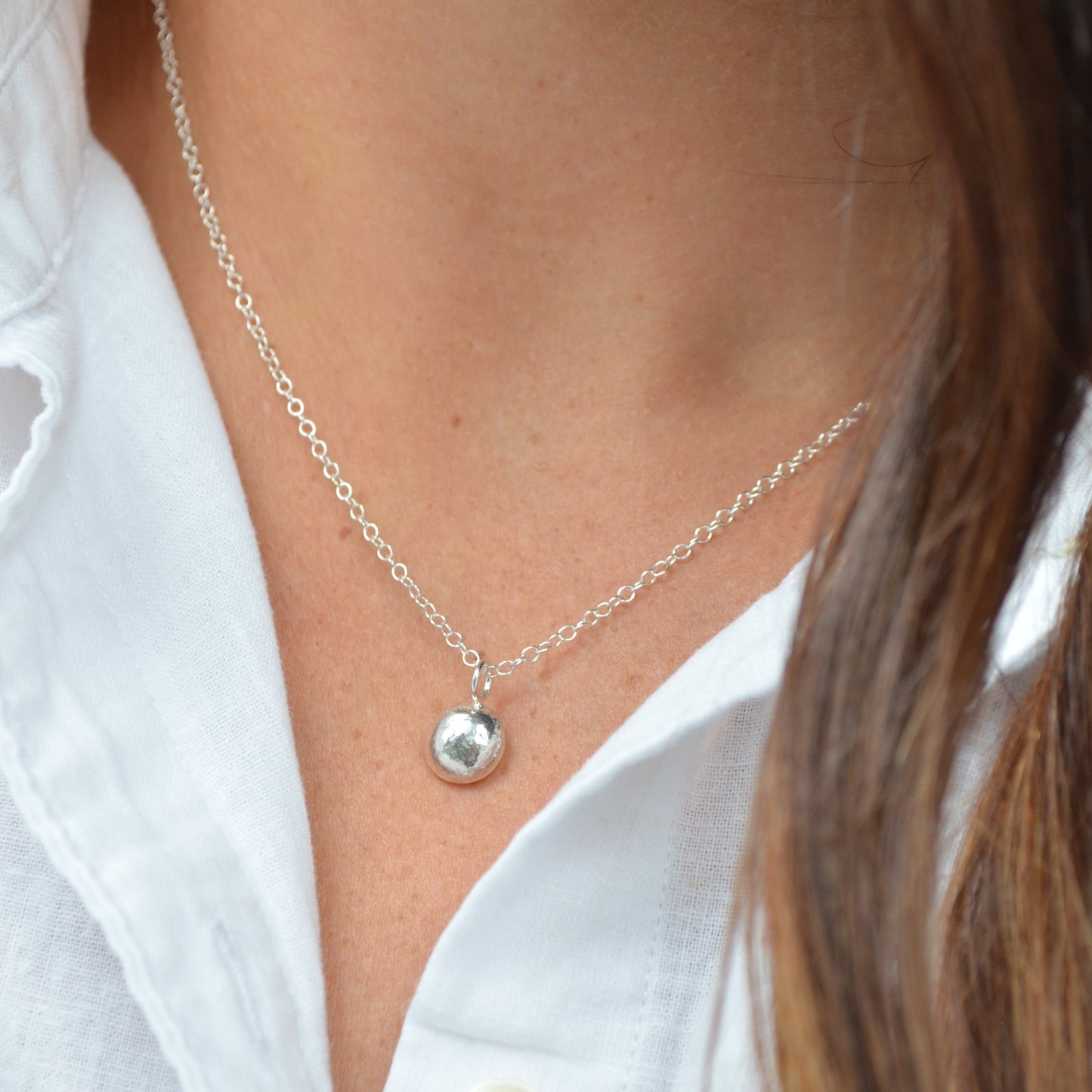 Silver chain with silver charm