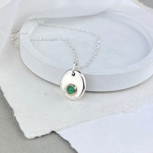 Emerald pendant in silver and 9ct gold