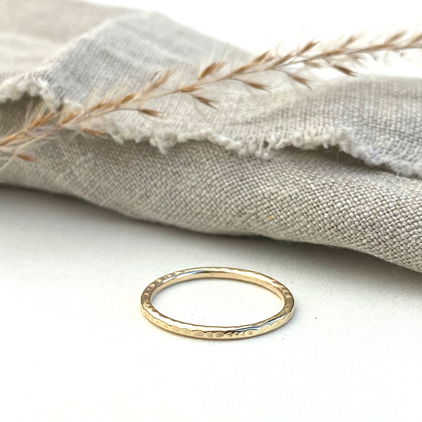 The Spur Hammered 9ct gold Stacking Ring - 9ct yellow gold skinny textured stacking ring