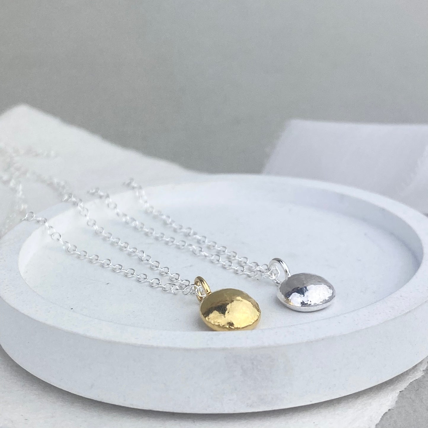 The Penny Charm necklace- sterling silver and 22ct gold vermeil charms on a trace chain necklace