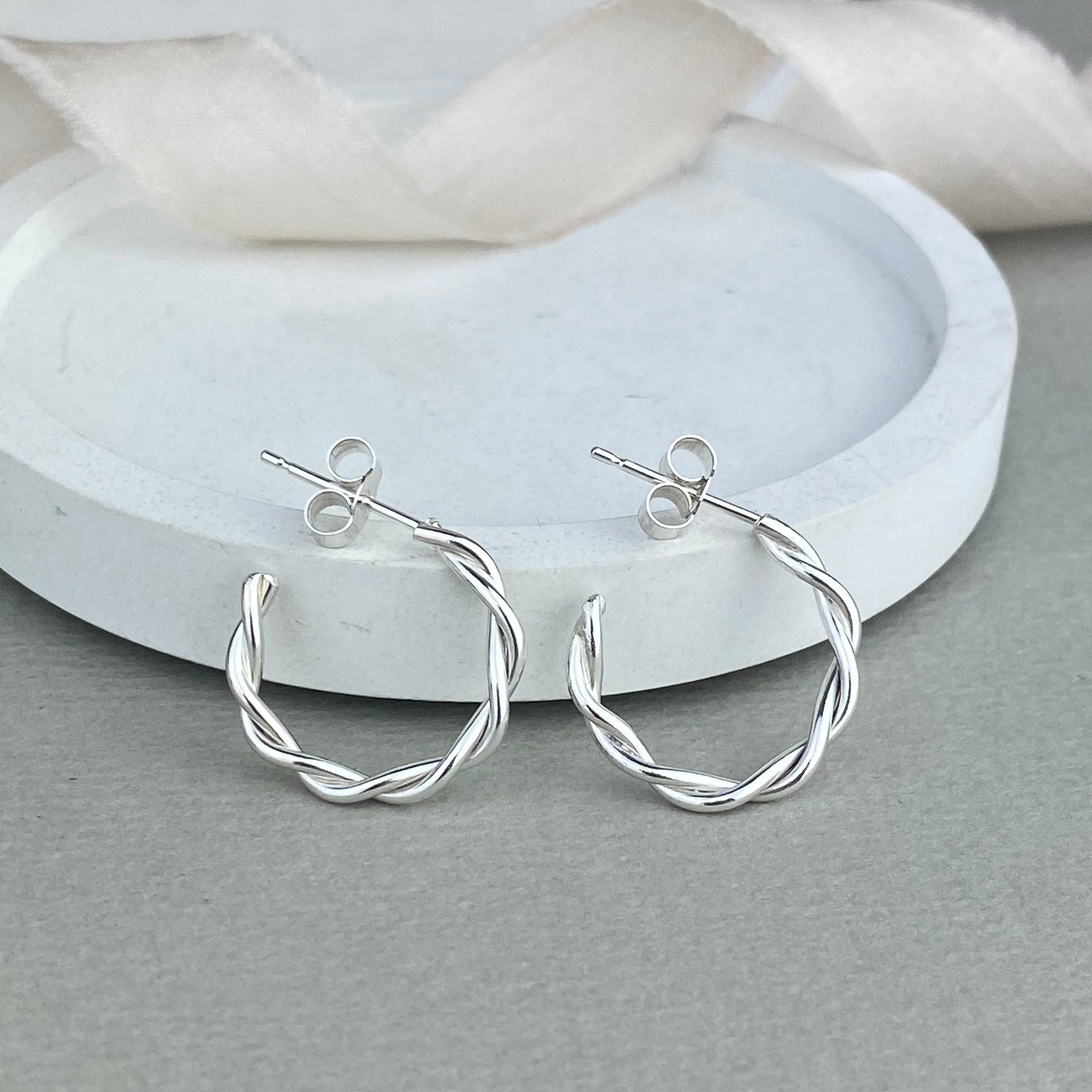 Twisted silver hoop earrings 