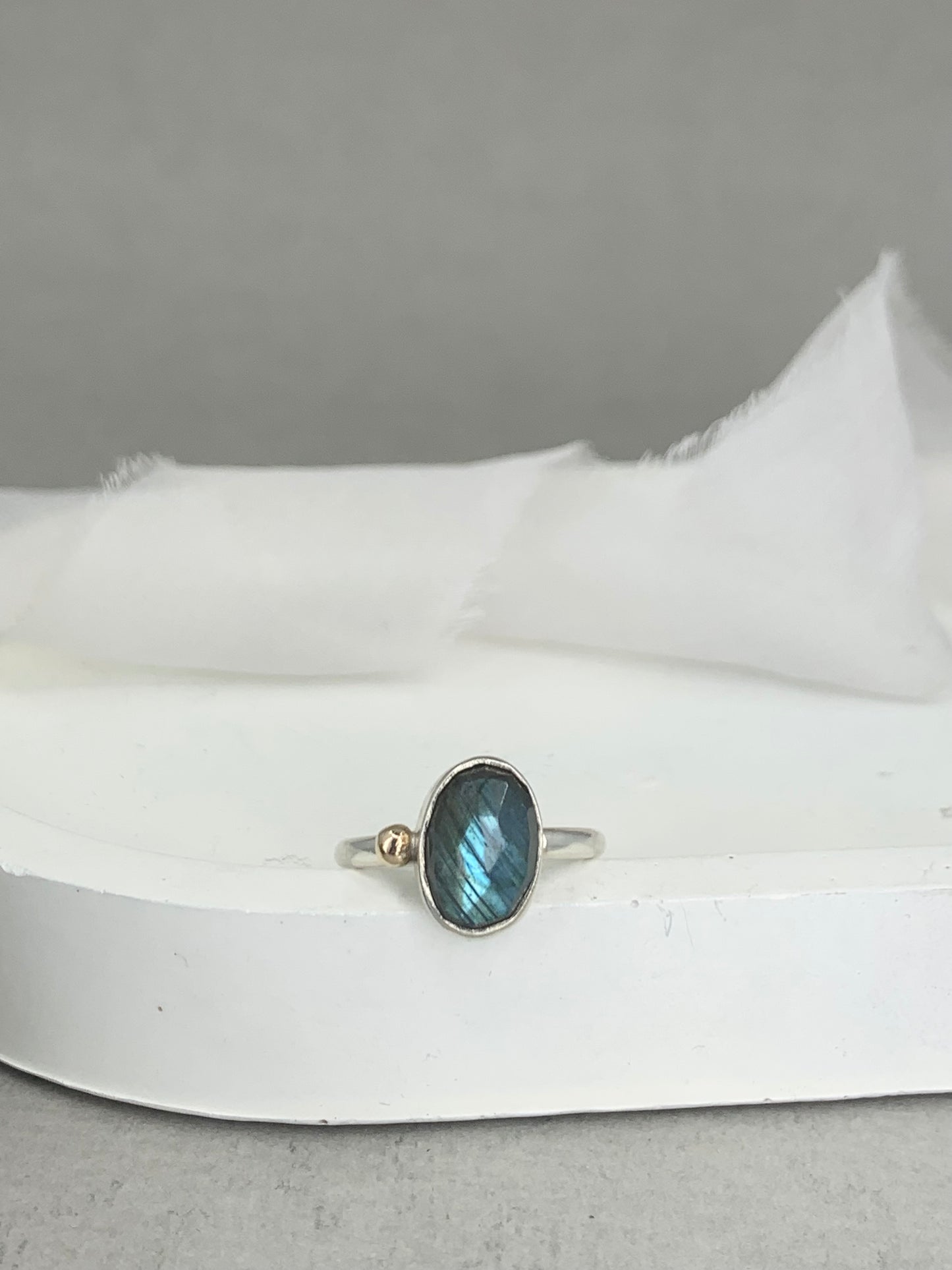 Laboradite offset silver and 9ct gold ring