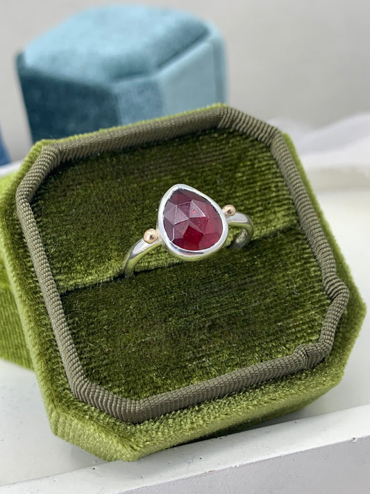 Garnet ring in sterling silver with 9ct gold detail