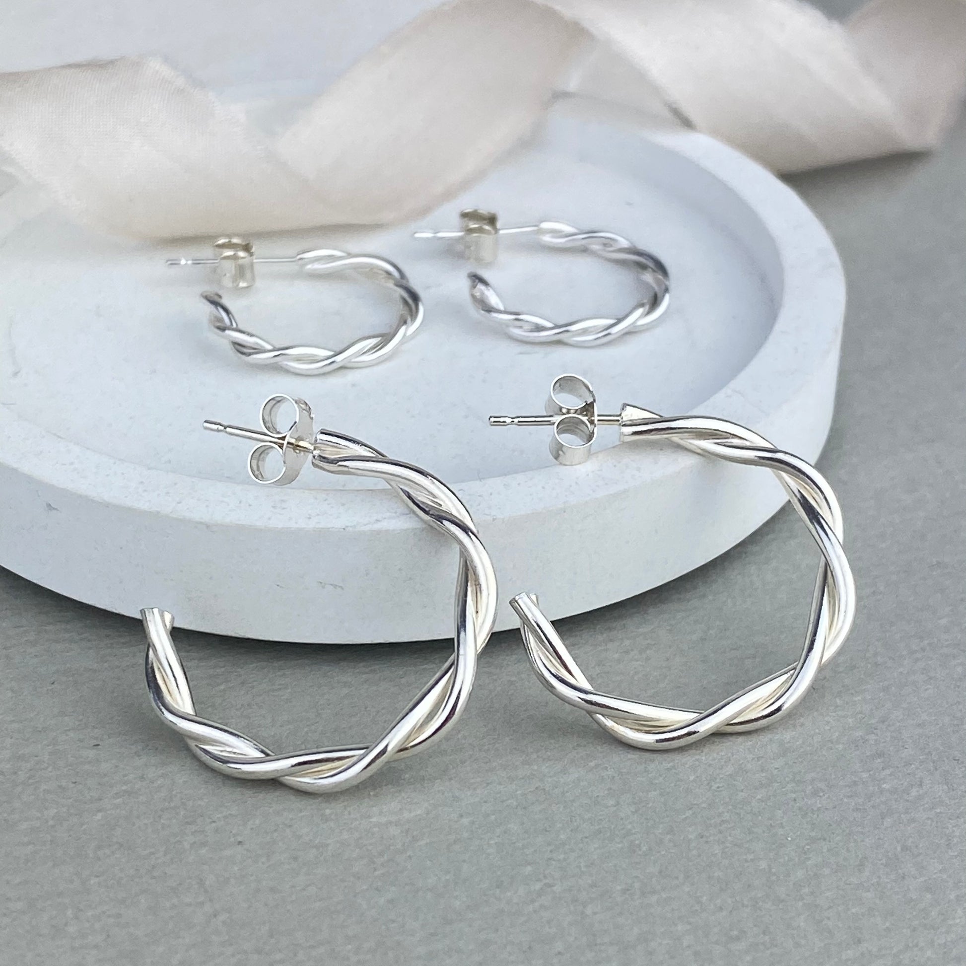 Twisted silver hoop earrings