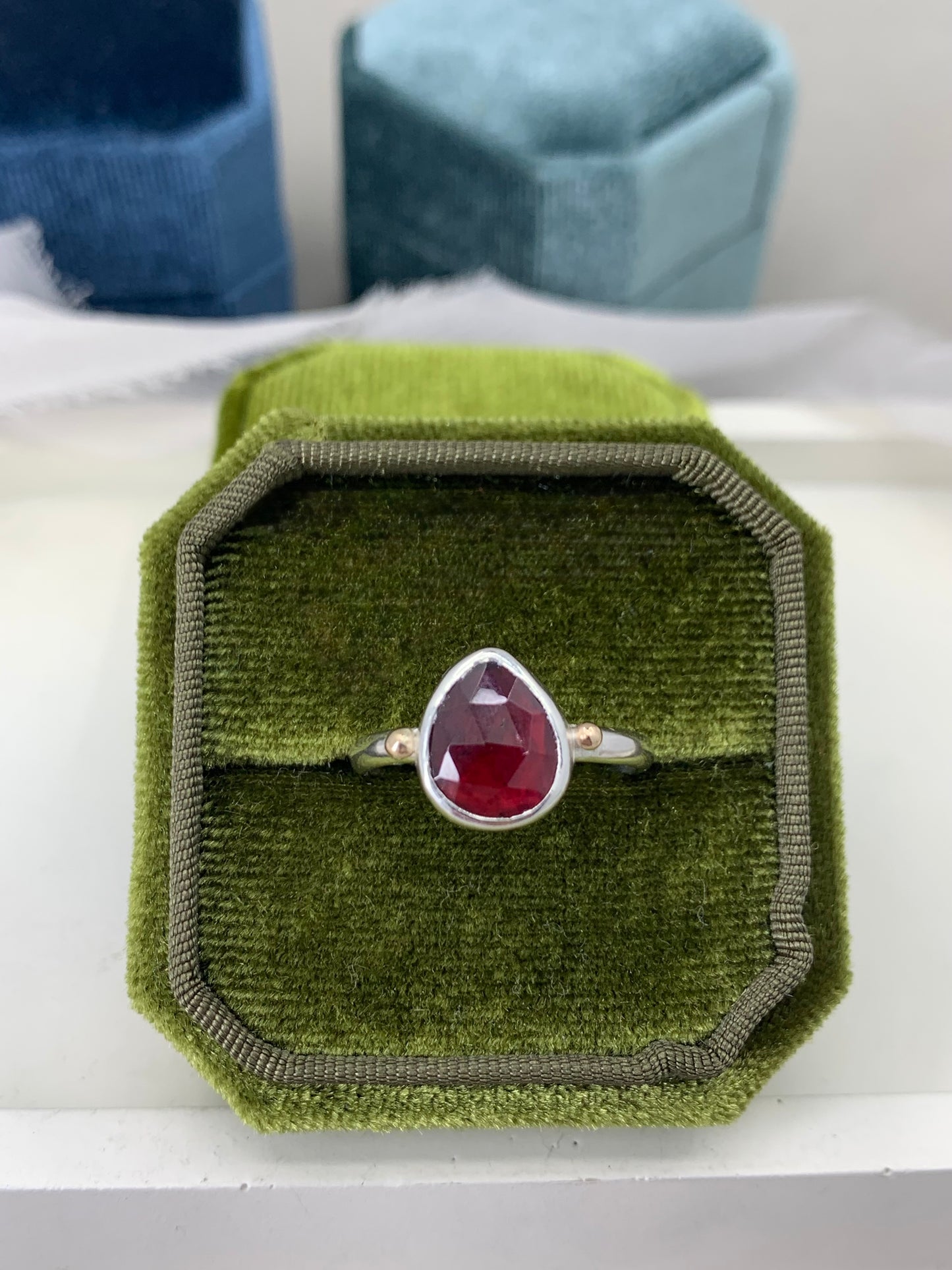 Garnet ring in sterling silver with 9ct gold detail