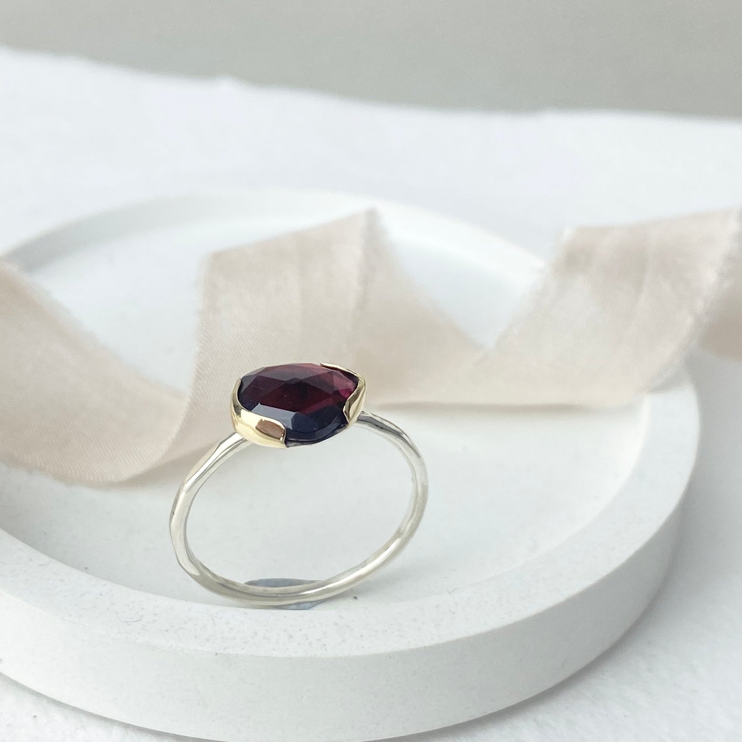 Garnet ring in silver and 9ct gold
