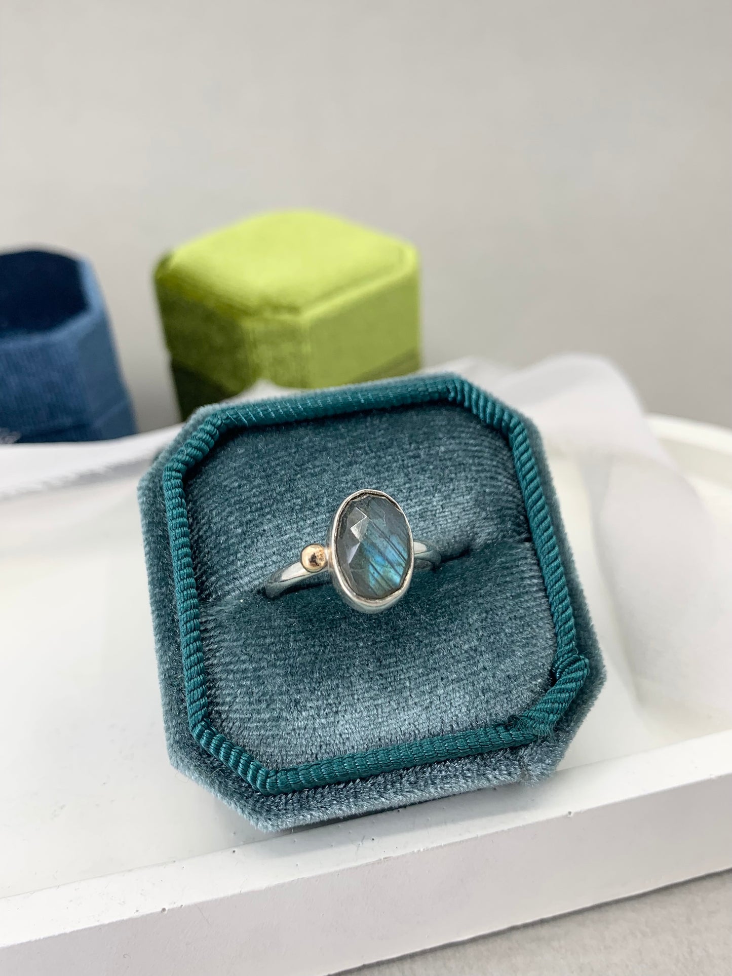 Laboradite offset silver and 9ct gold ring