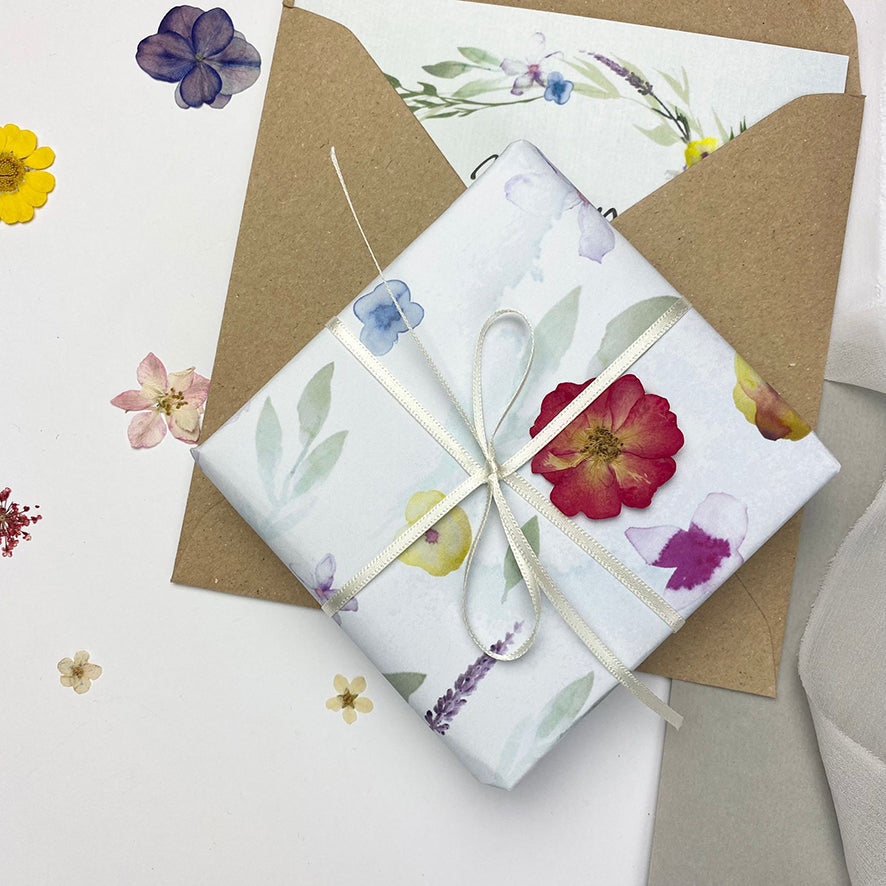Luxury gift wrap and a gift card and envelope