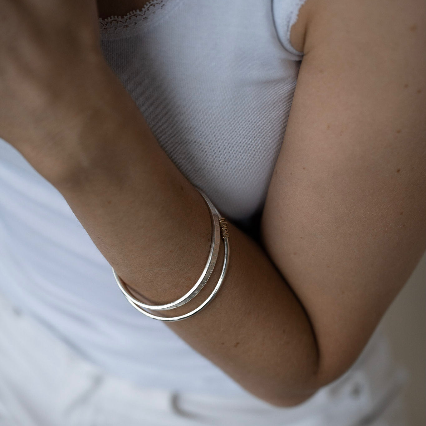 The Tanner Personalised Bangle - sterling silver with 12ct gold twist personalised textured bracelet - hand stamped secret message jewellery