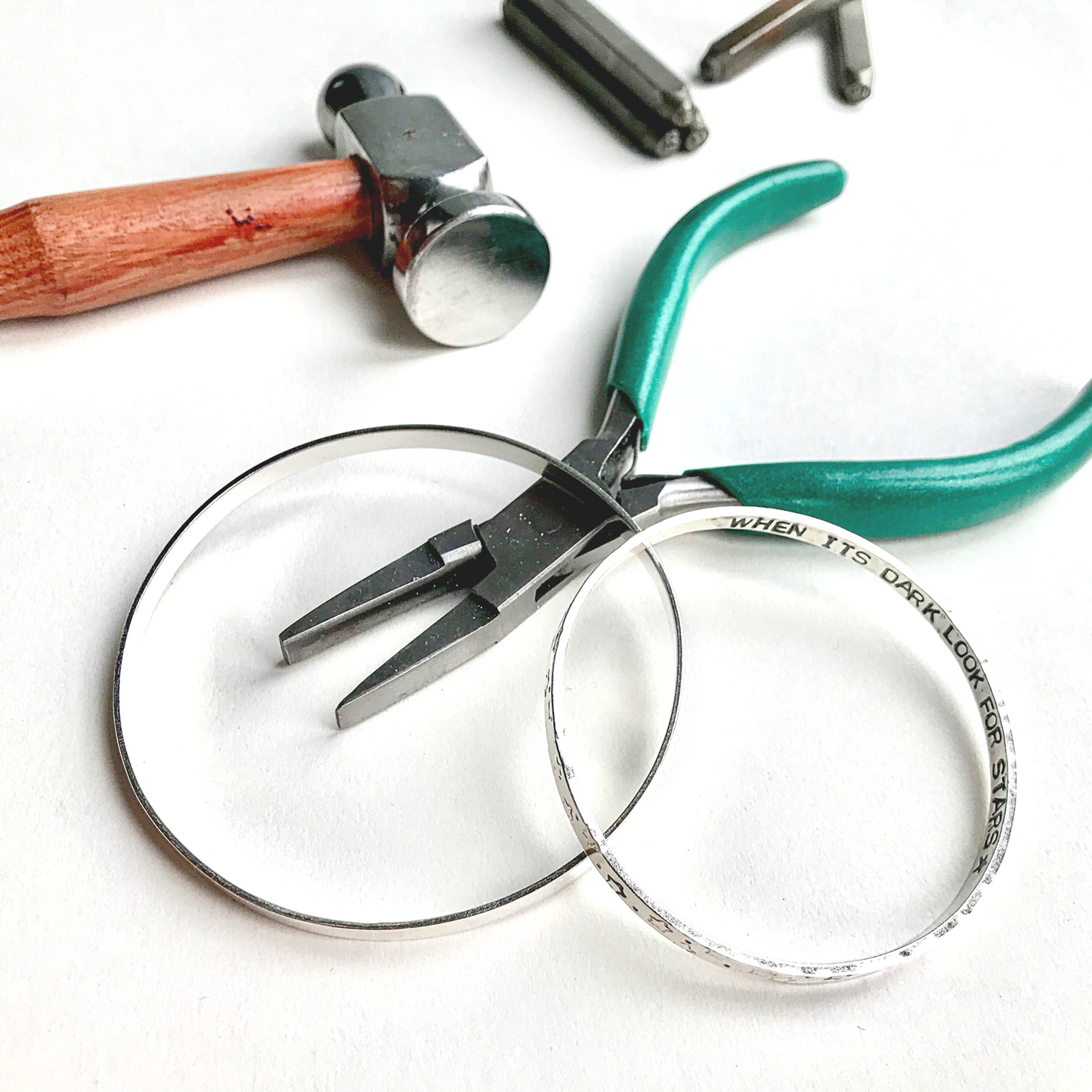 silver bangle with stamped message workshop