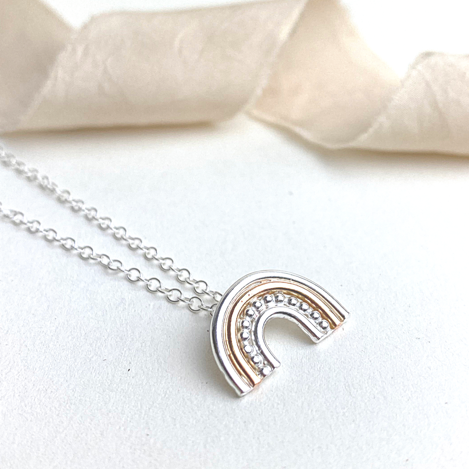 The Shiner Rainbow Necklace - sterling silver and 12ct rose gold rainbow pendant necklace - mixed metal jewellery