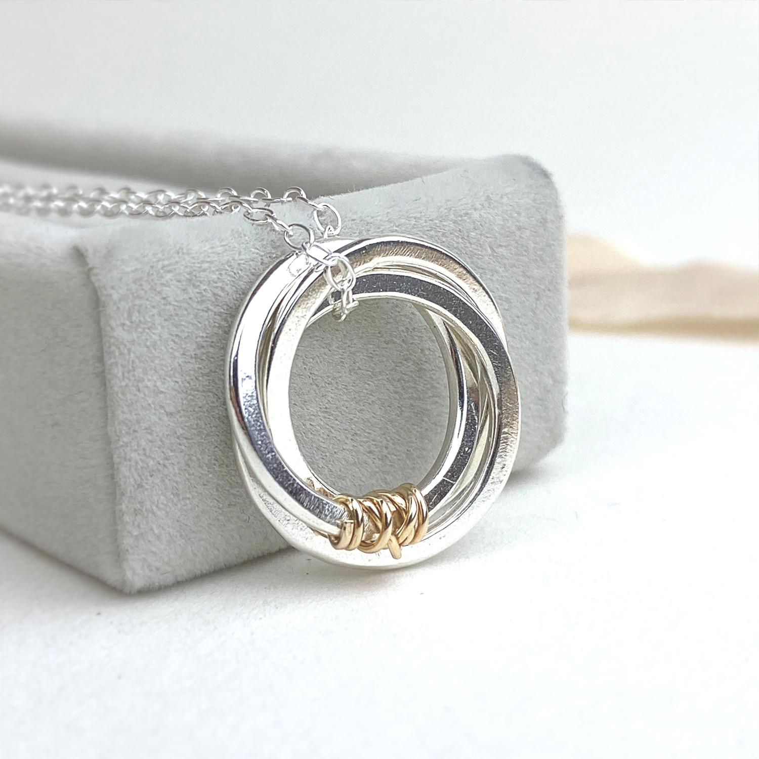 The Tanner Hoop Necklace - sterling silver hoop necklace with 12ct filled gold twist - entwined Russian style interlinked rings