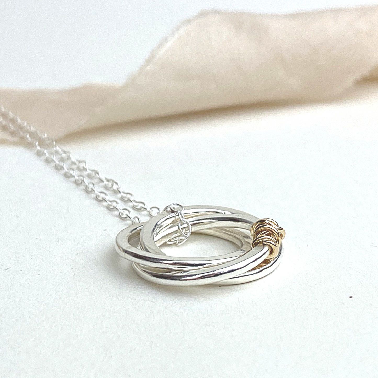 The Tanner Hoop Necklace - sterling silver hoop necklace with 12ct filled gold twist - entwined Russian style interlinked rings